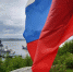 В честь Дня России гигантский российский флаг взвился над главной базой Северного флота - Арктик-ТВ