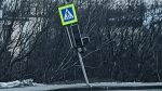 В североморском Кишлаке дорожный знак и светофор развернуло на 180 градусов от удара авто