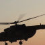 Вертолет на фоне заката - ИА Nord-News.Ru