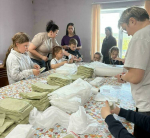 Маленькие североморцы помогли волонтерам подготовить посылки для отправки «за ленточку»