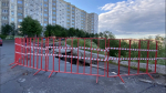 В Североморске после сильного дождя провалился асфальт